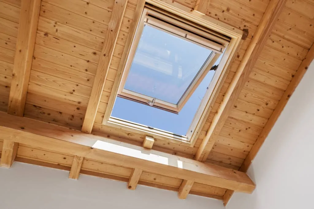 Skylight installed on a residential roof by Above Roofing