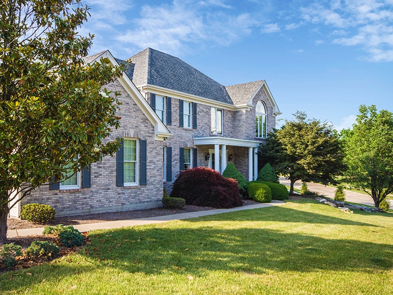 Picture of a house with a pitched, shingle roof