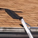 Shingles missing on a damaged roof